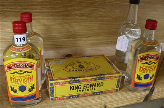 A box of cigars and four bottles of gin